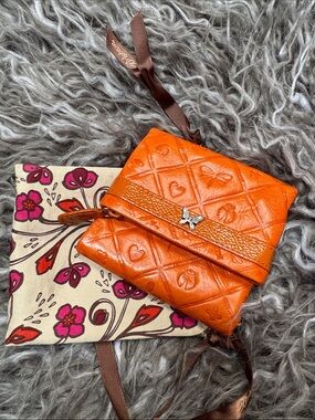 Brighton Orange Embossed Leather Trifold Wallet with Butterfly Accent
